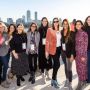 Photo of nine MIT Alumnae with Boston backdrop