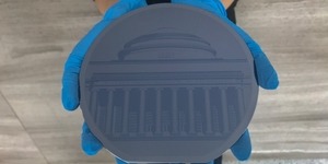 One.MIT, a mosaic depicting the MIT Great Dome formed by etching more than 270,000 names on a 6-inch-diameter silicon wafer