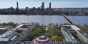 View of the Boston skyline with Captain America's shield on the MIT Great Dome