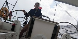 Laura Aust on the deck of her sailboat