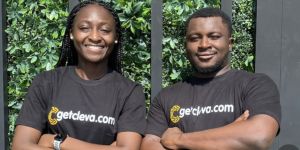Cleva founders Tolu Alabi, left, and Philip Adama Abel ’15 stand side by side with arms folded wearing company T-shirts.