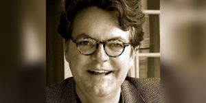 Sepiatone headshot of Gregory Beck