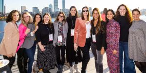 Photo of nine MIT Alumnae with Boston backdrop