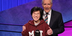Jeopardy! host Alex Trebek congratulates Lilly Chin ’17 on her College Championship victory in February.